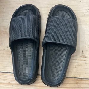 Black slip on sandals